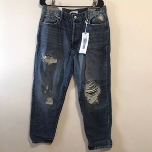 Forever 21 the Westwood mom Blue jeans size 31 distressed 
New with tags.